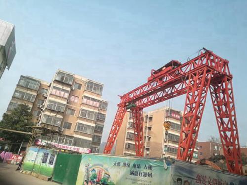 工廠抓斗龍門吊可用于生產廢料處理作業